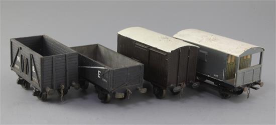 A NE open wagon no.2573, in grey, a NE open wagon, no.97611, in black, an SR box wagon, no.61250 and